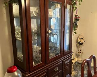 Beautiful hutch with all glass shelves and lots of storage. Like new!