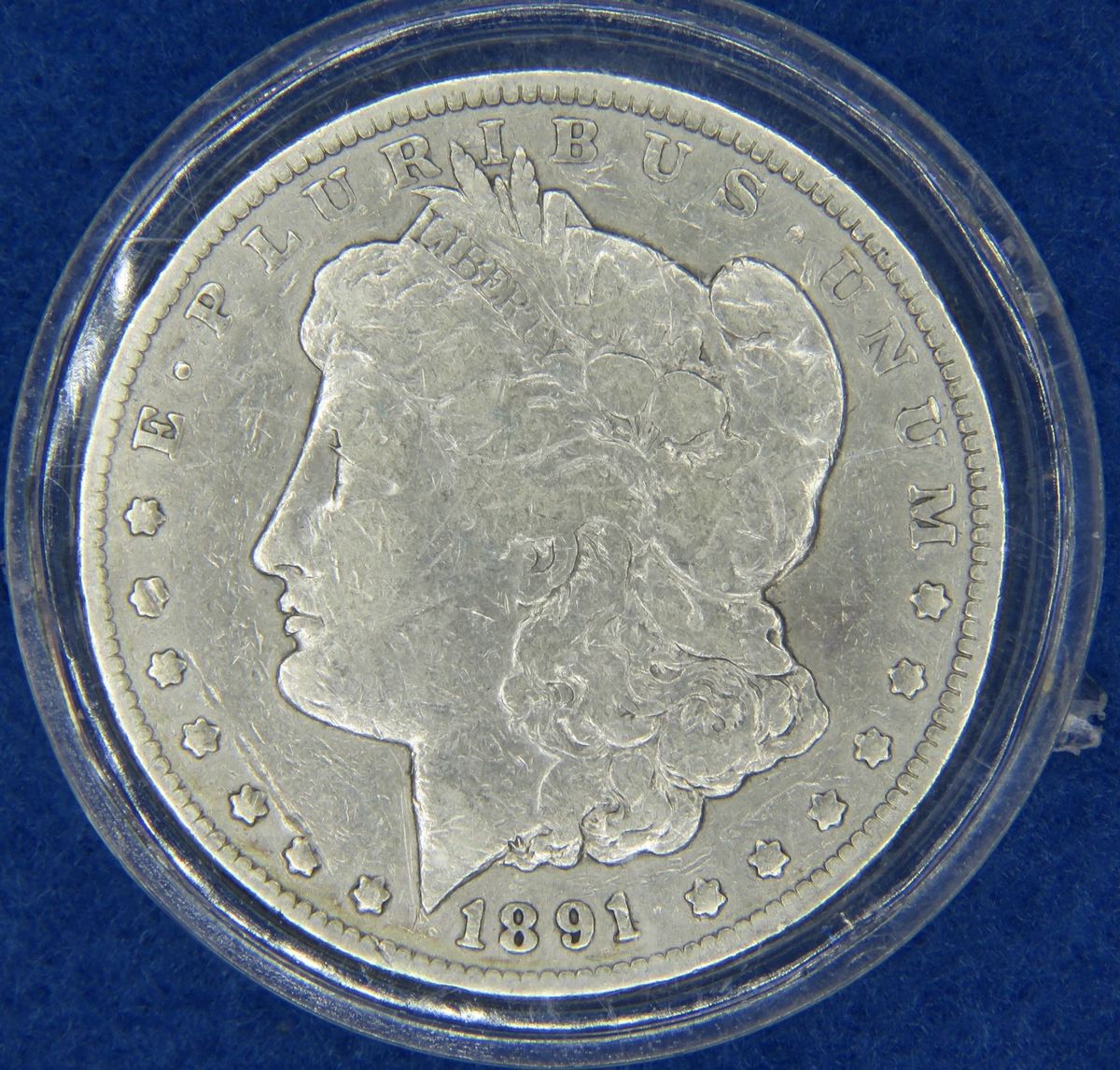 Lot 140. 1891 CC Morgan Silver Dollar