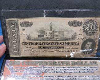 Lot 194. $20 Confederate dollar bill in a case with a description of