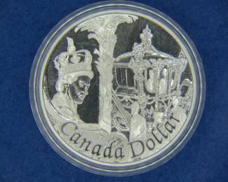 Lot 144. 1977 Canadian Proof Silver Dollar with COA commemorating Queen Elizabeth II Silver Jubilee. 25.175 grams grams with 92.5% silver.