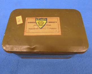 Lot 224. Old tin with collectible smalls