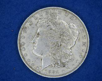 Lot 130. 1884 O Morgan Silver Dollar