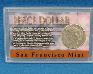 Lot 202. 1922 S Peace Silver Dollar in a plastic case