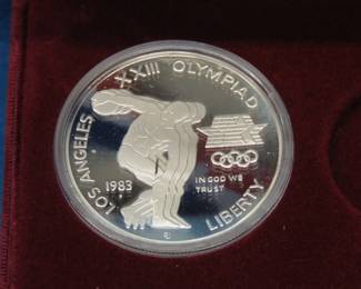 Lot 143. Commemorative 1983 Olympic Silver Dollar made with one 24.06 Grams of 900 fine silver.
