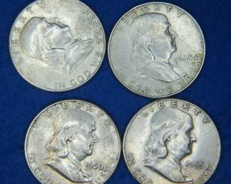 Lot 160. Four Franklin halves