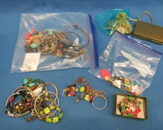 Lot 230. Costume jewelry and a mother-of-pearl makeup case