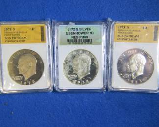 Lot 161. Three Eisenhower slabbed and graded Dollar Coins as follows: