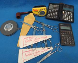Lot 223. Eight sets of shears, 100' Lufkin tape measure, Sony Walkman and two calculators