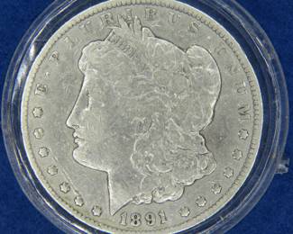 Lot 140. 1891 CC Morgan Silver Dollar