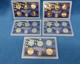 Lot 96. Five State Clad Quarter Sets with 5 quarters each: 2004, 2005, 2006, 2007 and 2008.
