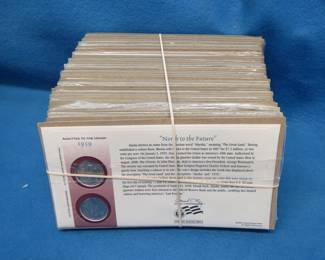 Lot 151. 46 US Mint sealed cards each containing two state quarters from one of 46 different states along with a description of the quarter.