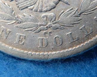 Lot 84. 1879 CC Morgan Silver Dollar