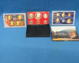 Lot 115. Four Coin Sets