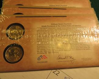 Lot 39. Twenty-two packets of two each gold-colored William Henry Harrison dollar coins (44 coins total)