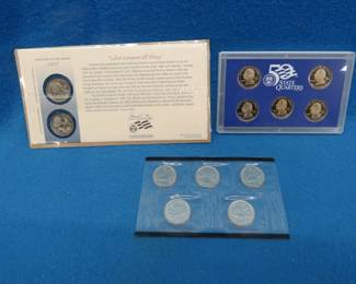 Lot 111. 12 Uncirculated State Quarters