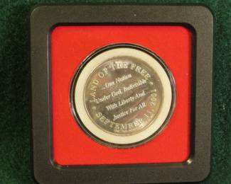 Lot 22. Land of the Free September 11, 2001 commemorative medal containing one troy oz. of .999 Silver