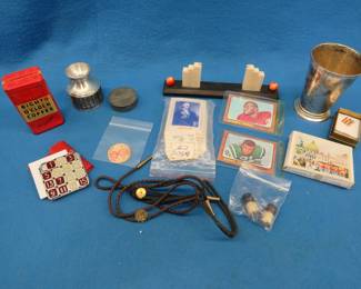 Lot 232. Two old coffee tins, fifteen puzzle, and more