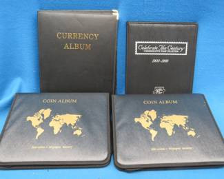 Lot 212. Four large empty albums for displaying paper currency, coins and stamps