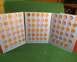 Lot 51. 50 Lincoln Wheat Pennies in a folder. 18 are pre-1920; 18 are from the 1920's and 14 are dated 1930 through 1940.