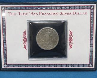 Lot 193. One 1908 80% Silver US Peso known as The "Lost" San Francisco Silver Dollar in a case with historical description.