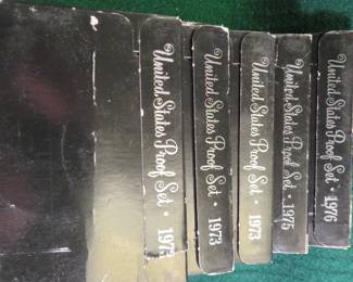 Lot 38. Five US Mint Proof Sets: 1973 (3), 1975 and 1976
