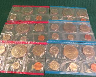 Lot 26. Three 1976 US Mint Uncirculated Coin Sets. Each set contains Denver and Philadelphia packets of coins.
