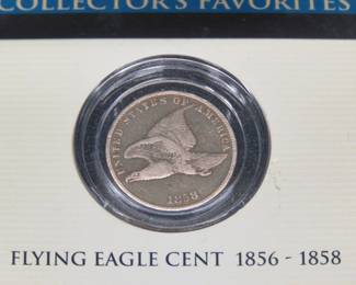 Lot 201. 1858 Flying Eagle penny in a display case