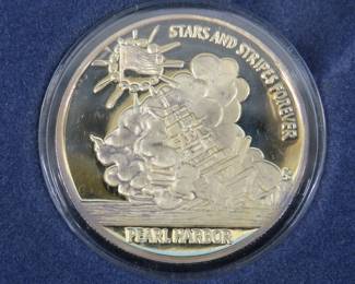 Lot 59. Commemorative coin for the 50th Anniversary of Dec. 7, 1941 made with one troy oz. of fine silver from The Hamilton Collection.