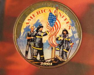 Lot 9. 2001 American Silver Eagle American Heroes Memorial Silver Dollar containing 1 oz. pure silver