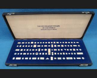 Lot 24. The 100 Greatest Stamps of the World Sterling Silver Miniature Collection