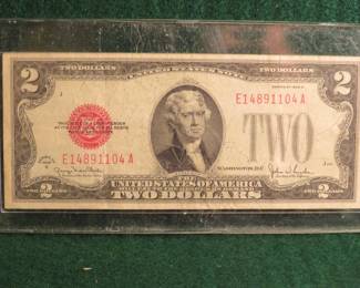 Lot 36. $2 red seal bill Series 1928 G
