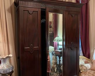 Antique Armoire with mirrored door