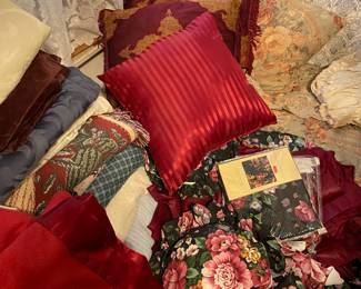 Lots of bedding, comforter sets, blankets ,pillows, etc