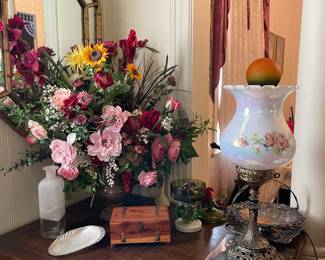 One more of many lamps, floral arrangement 