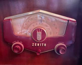 Very cool. Zenith Cobra Matic  Record Player, AM / FM Stereo cabinet.   Turns on will buzz.  
