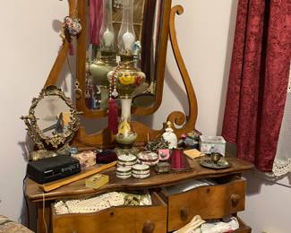 Antique Serpentine front dresser, lots of misc, lots of Doilees