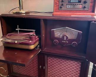 Very cool. Zenith Cobra Matic  Record Player, AM / FM Stereo cabinet.   Turns on will buzz. 