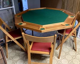 Vintage Game table with 5 chairs.  In fantastic condition