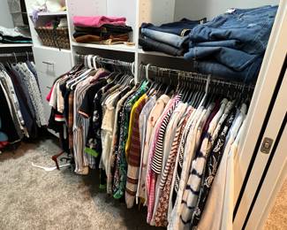 Designer womens clothes, sweaters, jeans, dress pants, blouses, tennis skirts, skorts, shorts, and more