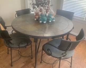 Slate topped table and wrought chairs
