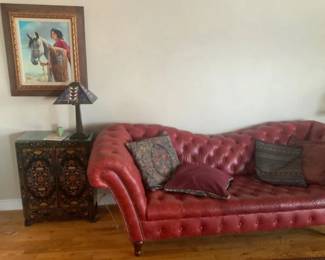 Chesterfield sofa and Asian cabinet