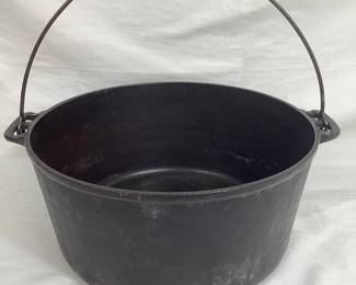 BIHY105 ERIE Cast Iron Cauldron  A large and heavy cast iron cauldron with a swinging handle. It is stamped "ERIE" on the bottom, as well as 836B 11.&nbsp;
