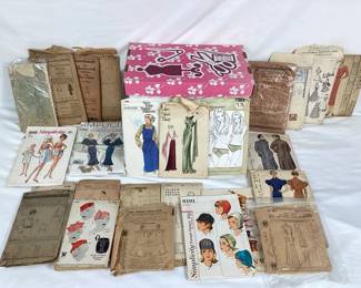 BIHY109 Antique Vintage Sewing Patterns A collection of 25 sewing patterns for women's clothing and fashion. Brands include Ladies Home Journal, McCall, Butterick, a few Vogue patterns and more. Vintage sewing pattern storing box included.&nbsp;
 