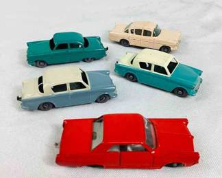 BIHY701 Vintage Lesney Of England Cars Set of five 1950s-1960s die cast cars. Includes No. 22 1958 Vauxhall Cresta, No. 33 Ford Zodiac, one light blue and one turquoise No. 43 Hilman Minx, and No. 22 Pontiac GP sports coupe.
