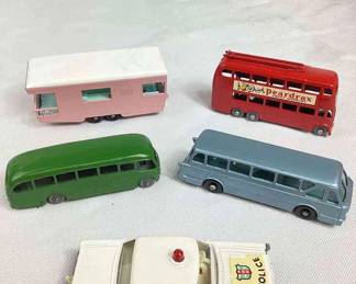BIHY702 Vintage Lesney Cars, Vans And Busses Includes No. 55/59 Ford Galaxy police car, No. 40 Royal Tiger Coach, No 21 Bedford Duple Luxury Coach, No 56 London Trolleybus, and No 23 Trailer Caravan.
