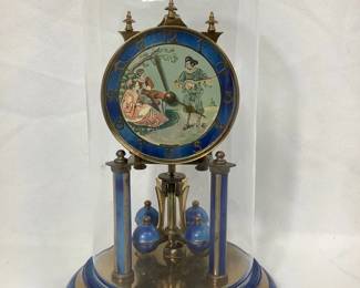 REEM810 Vintage Torsion Pendulum Anniversary Clock Vintage torsion pendulum clock, also known as an anniversary clock or 400 day clock, from Jahresuhrenfabrik, or the Schatz Clock Company. Stamped as made in 1949. Not operational from the key, which will not actually turn despite being included, but if set spinning manually, otherwise keeps time as normal.
