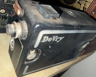 some OLD movie cameras inc DeVry