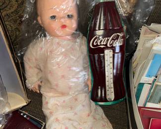 mOre babies under plastic, and Coca-Cola thermometer