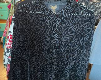 Many gorgeous women’s plus plus sized garments, many new with tags. 