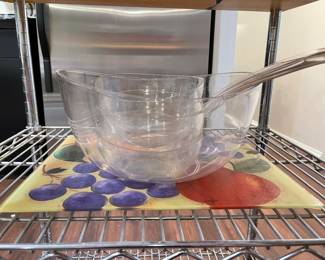 Clear plexi salad set with four bowls and matching serving spoon and fork. 
